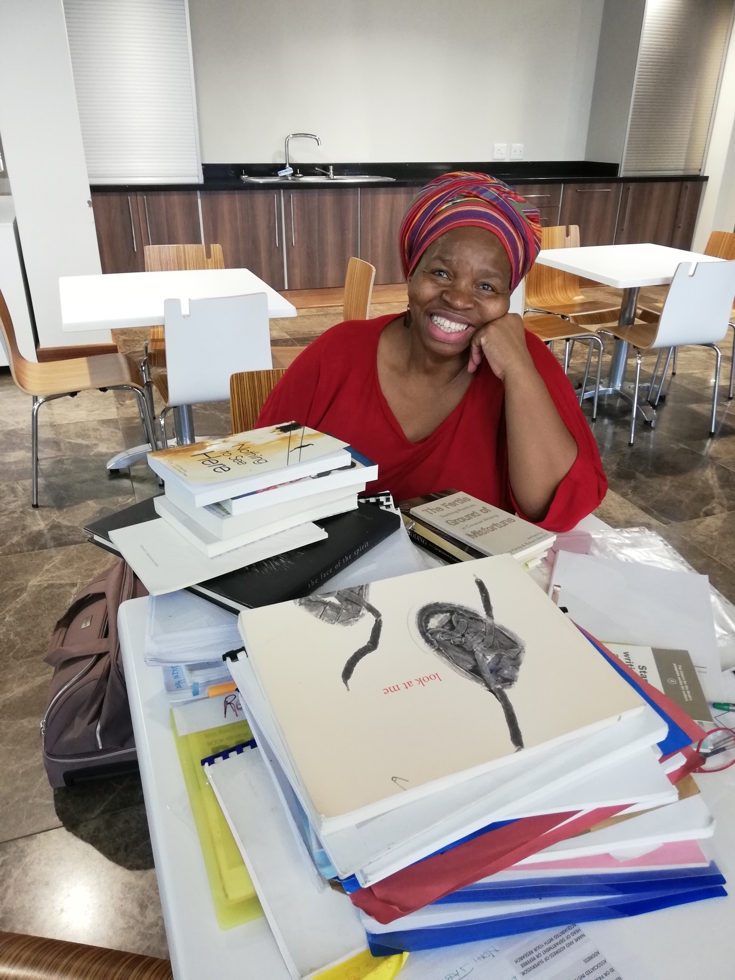 Makhosazana Xaba delivering her manuscript material to Amazwi to be conserved as part of South Africa's literary heritage.